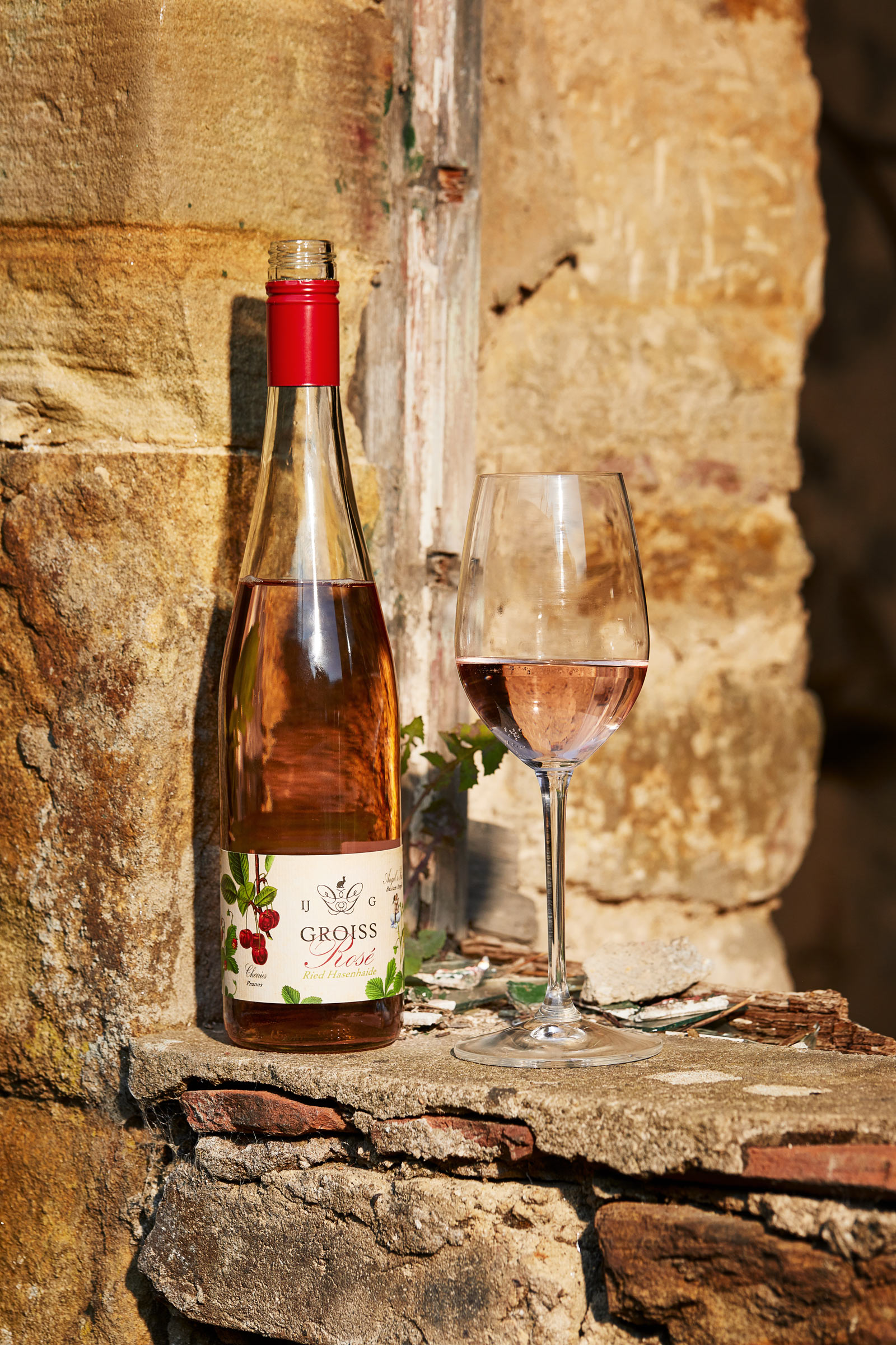 Bottle and Glass of Groiss Rose Wine for De-Burgh Wine Merchants, Alastair Ferrier food and drink photographer Edinburgh.
