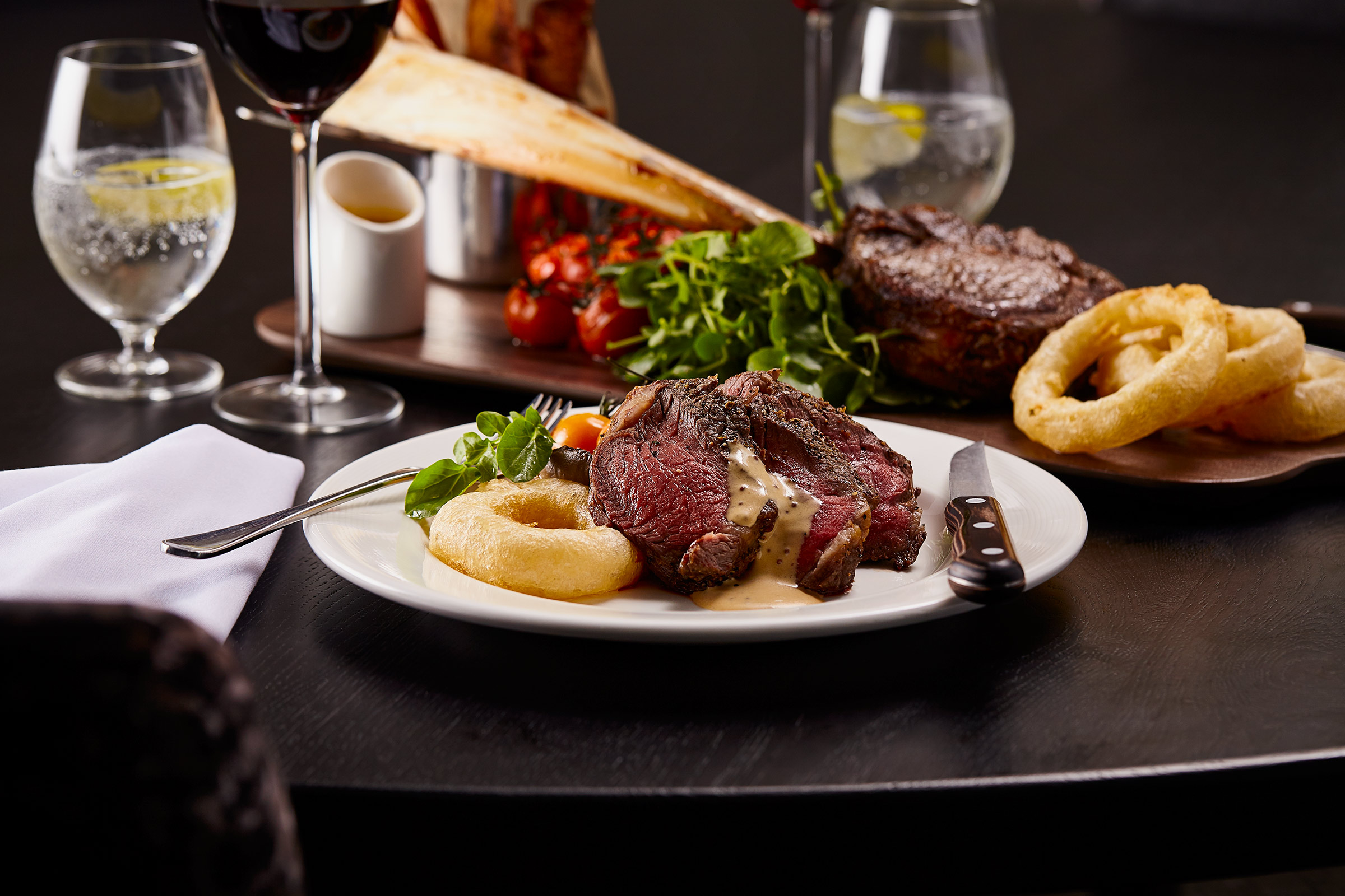 Tomahawk Steak, pepper sauce and onion rings, Scotts restaurant, Glasgow food photographer